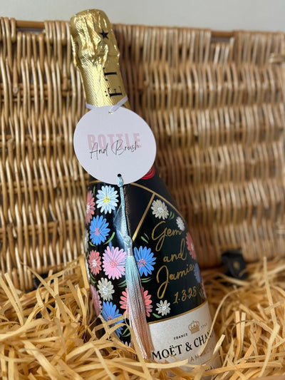 Bottle of Moët & Chandon champagne with floral design for an engagement gift