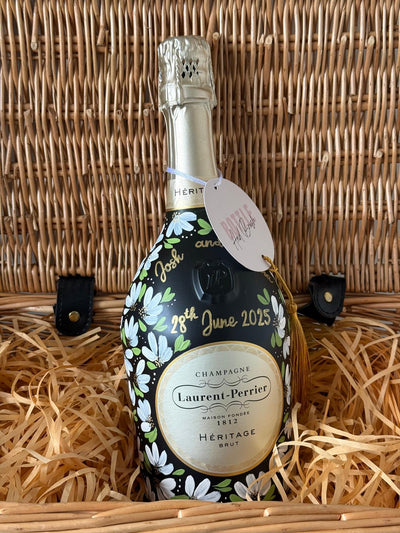 Laurent-Perrier champagne bottle with floral painted design for engagement
