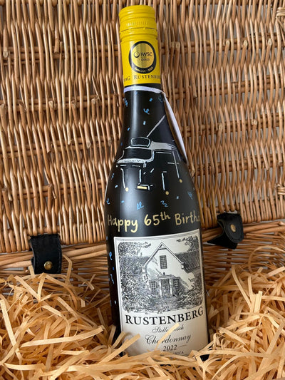 Bottle of Rustenberg wine with a hand painted piano for a male client gift