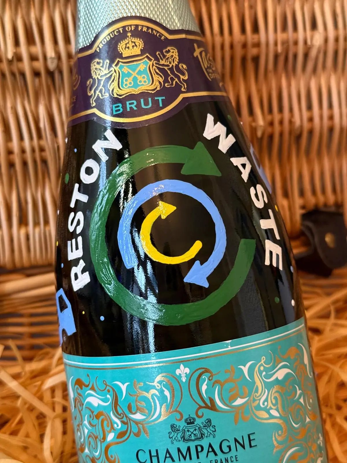 Reston Waste branded champagne bottle gift
